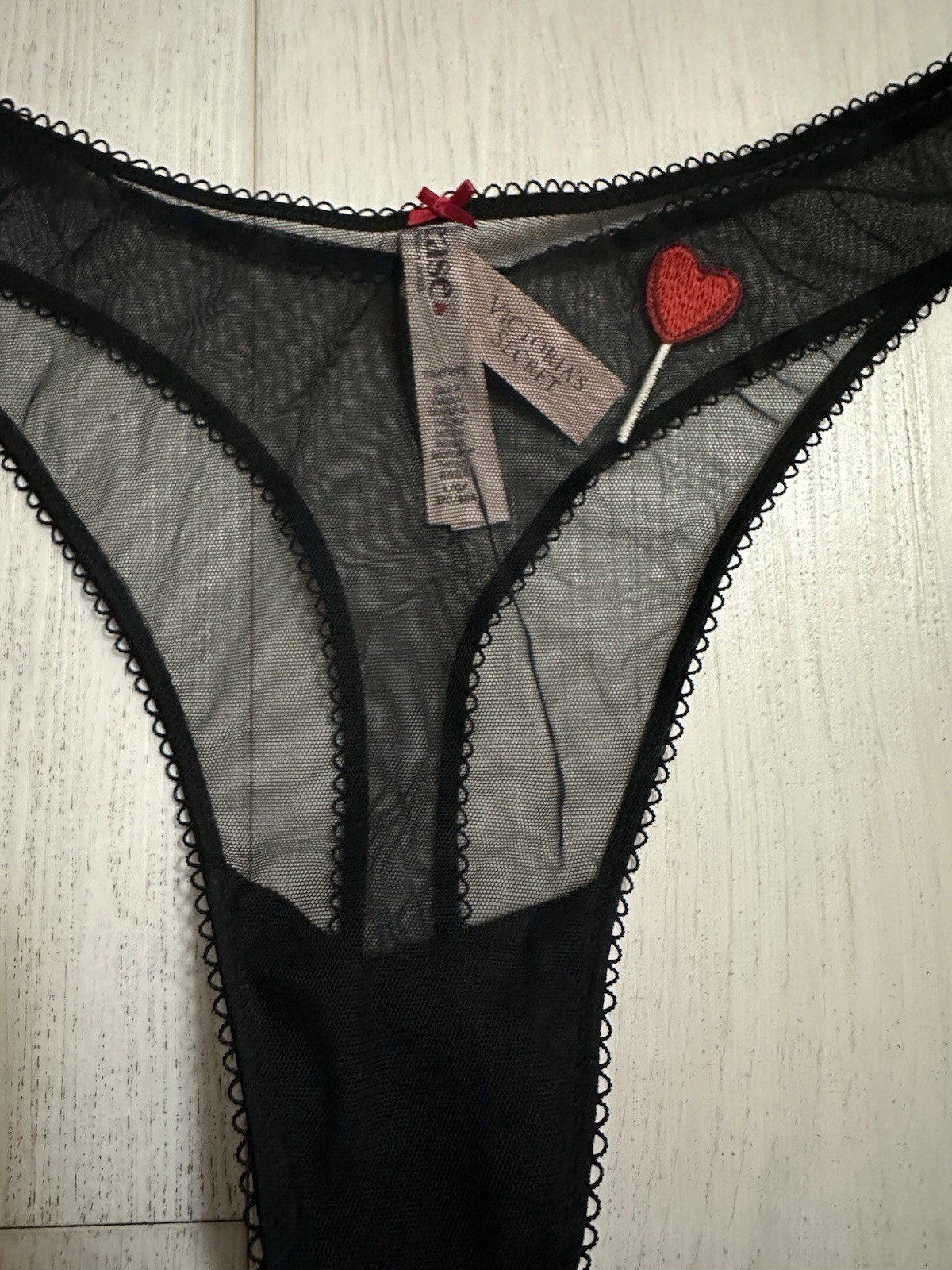 NWT Victoria’s Secret Tease Thong Sz L Black Mesh Hear Lollipop Embroidered