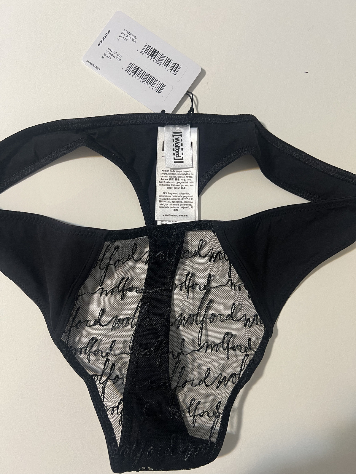 Wolford embroidered logo obsessed tulle Black Med string thong panty Retail $80