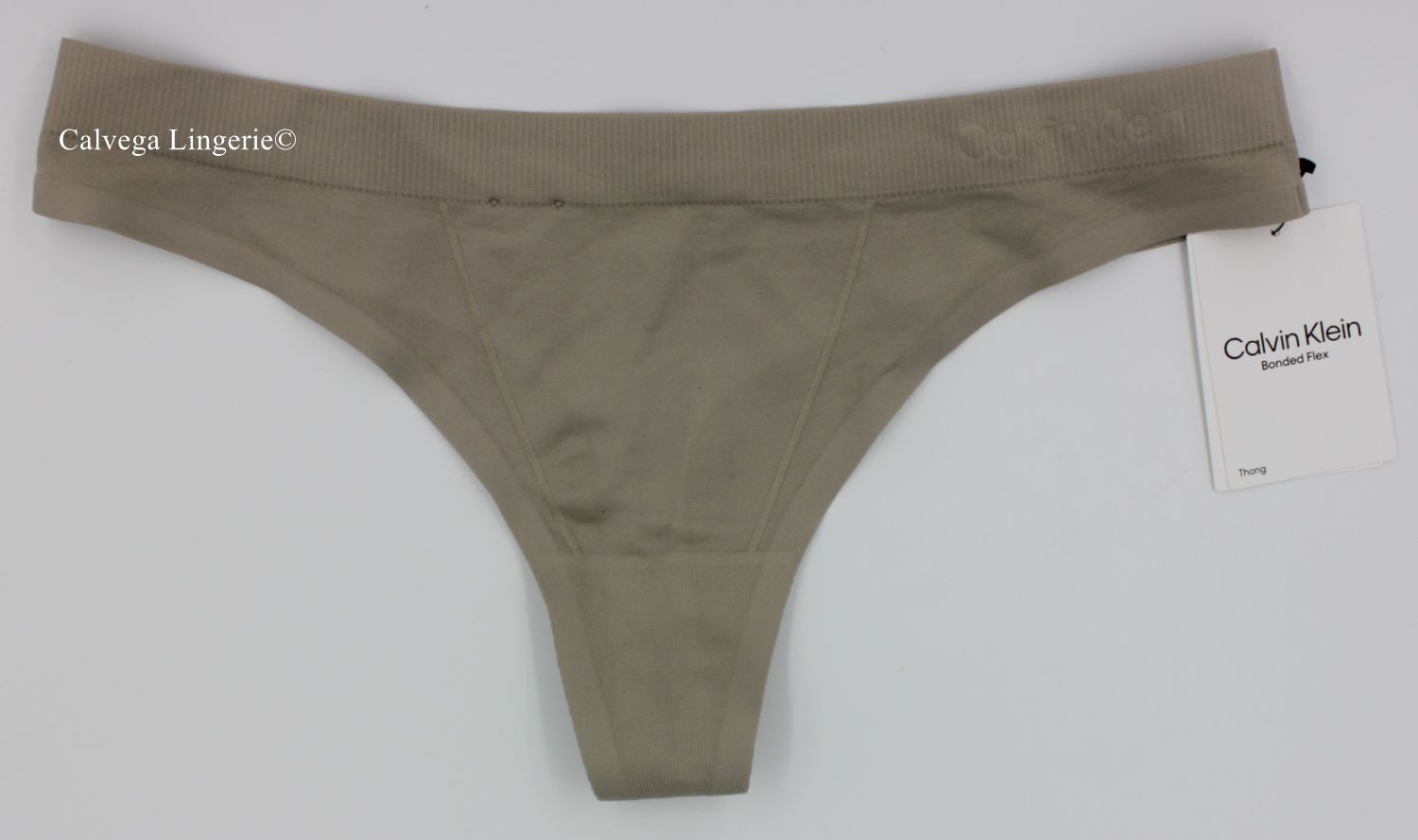 NWT Calvin Klein QF6611 “Bonded Flex” Seamless Laser Cut Nylon Thong, Gray, M