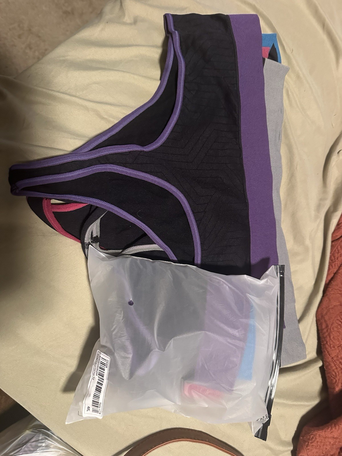 Women’s Seamless Stretch Thong Panties 4-Pack Black/Purple Trim Size 4x