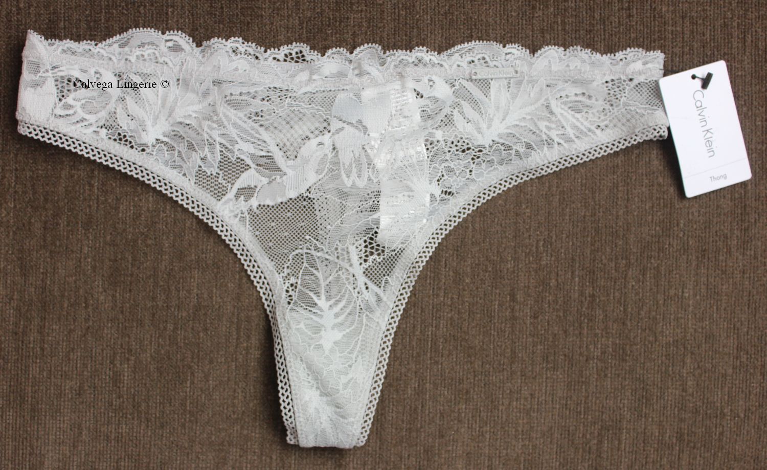 NWT Calvin Klein QF4633 “Bird Lace” All Lace Thong, Light Gray (092)