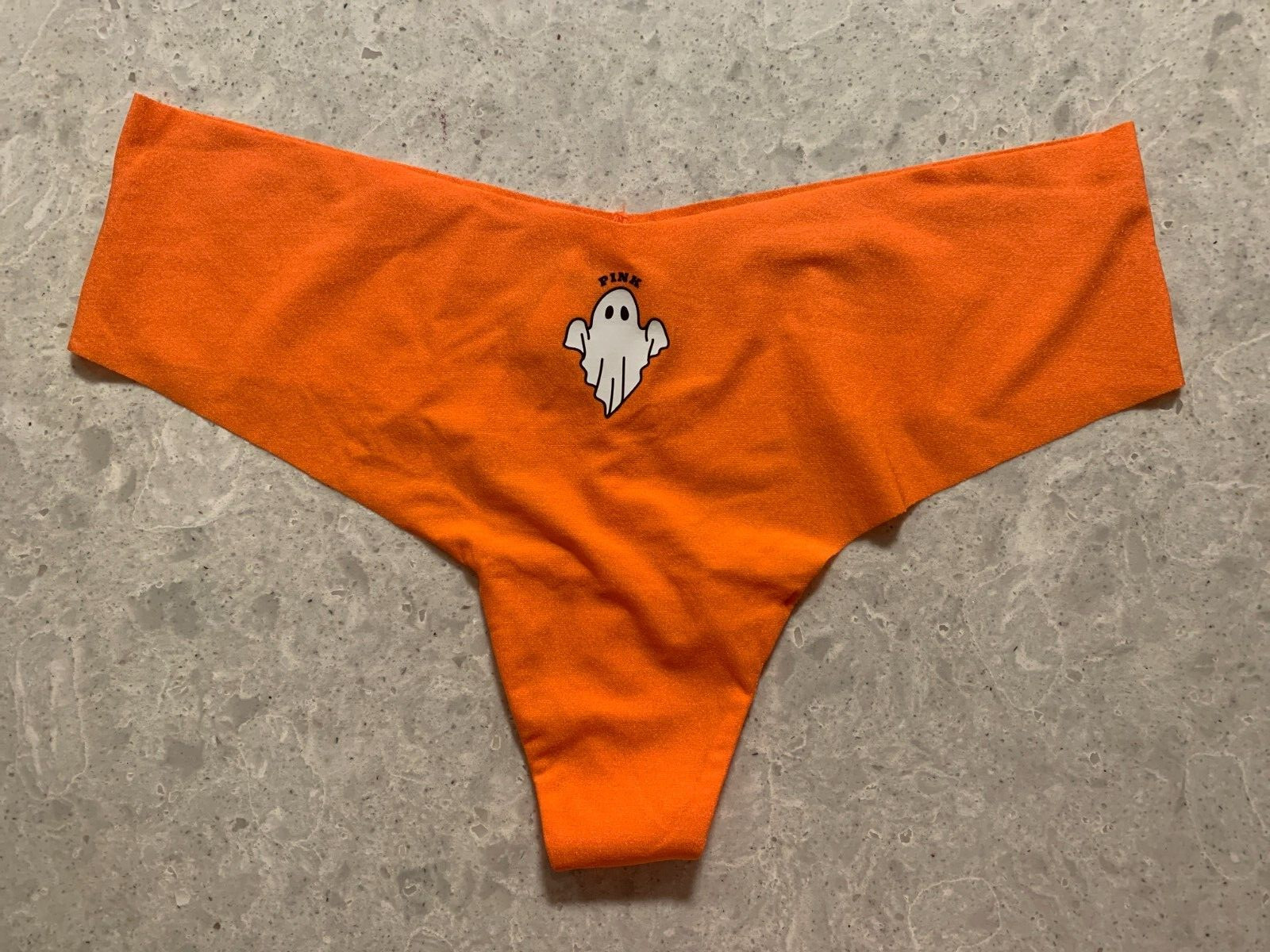 NWT Victoria’s Secret Pink Seamless Orange Thong with Ghost: Large