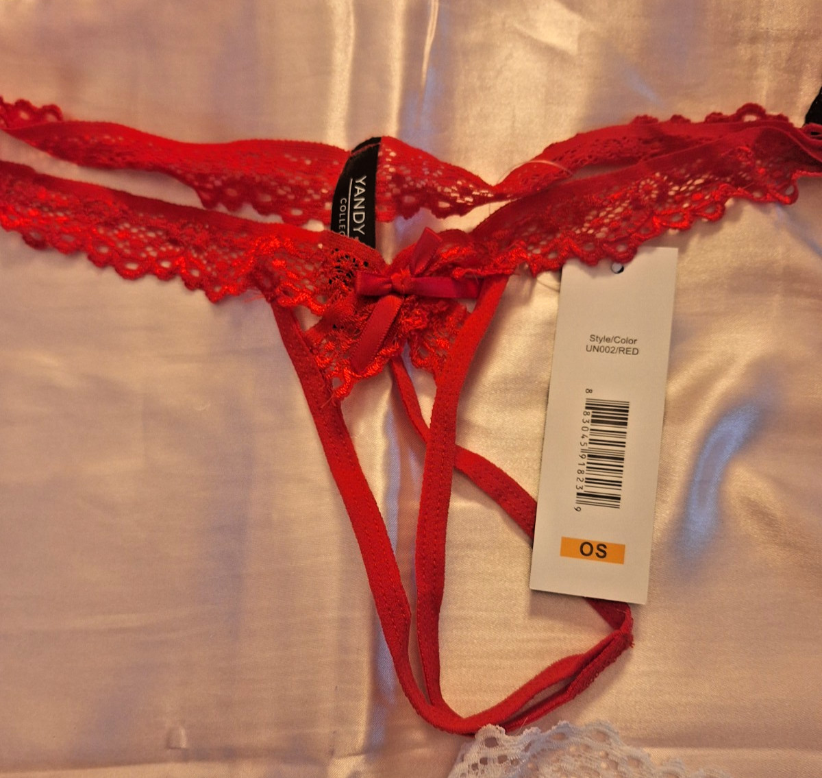 Yandy crotchless lace thongs in red, black, white (One size) Lot of (3)
