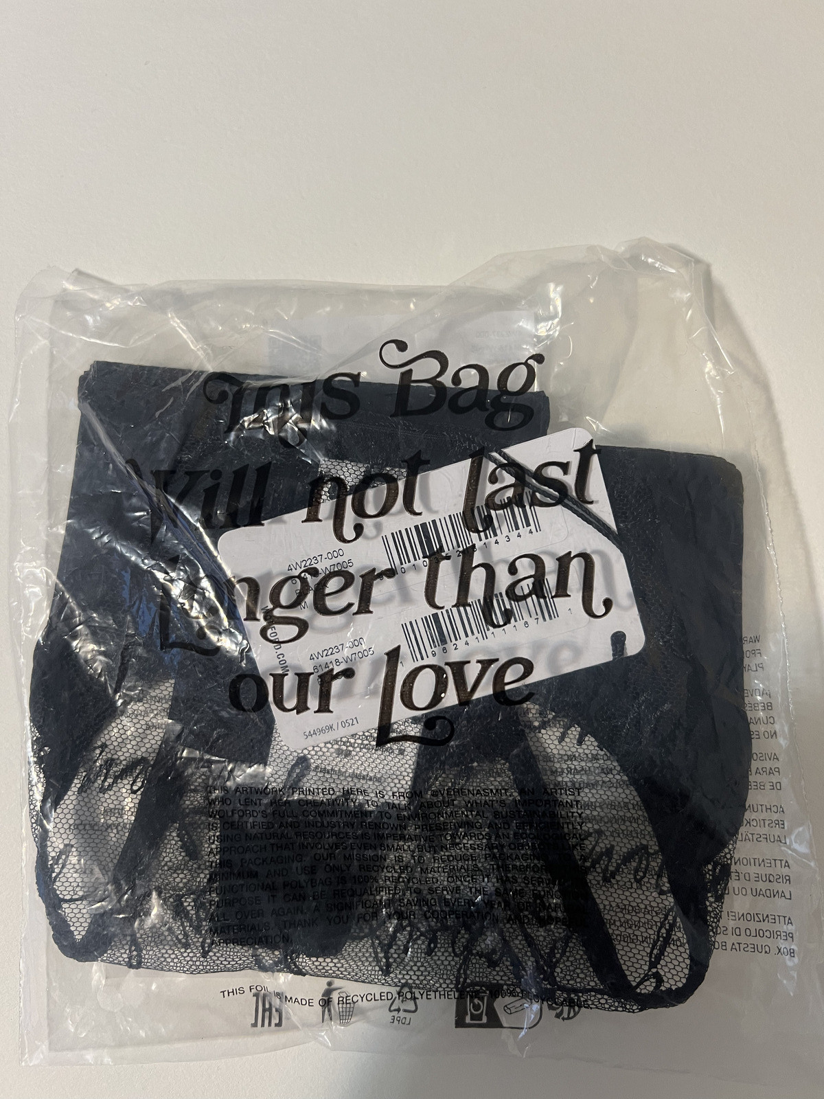 Wolford embroidered logo obsessed tulle Black Med string thong panty Retail $80