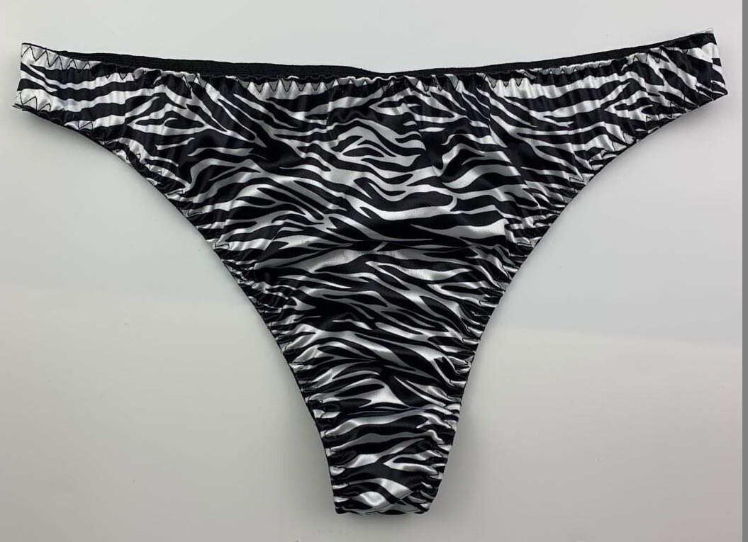 SEXY ANIMAL PRINT THONG PANTIES SIZE LARGE 90% POLYESTER 10% SPANDEX NEW