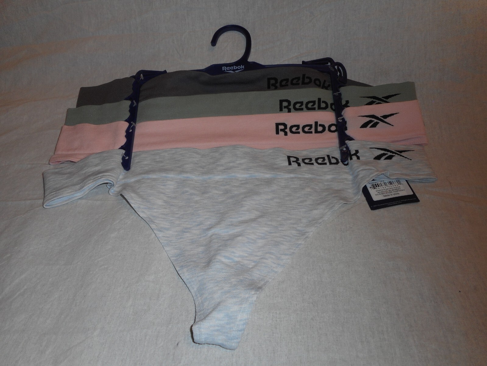 4 Pack Reebok Multi Color Extra Large & Large Seamless Thong Panty
