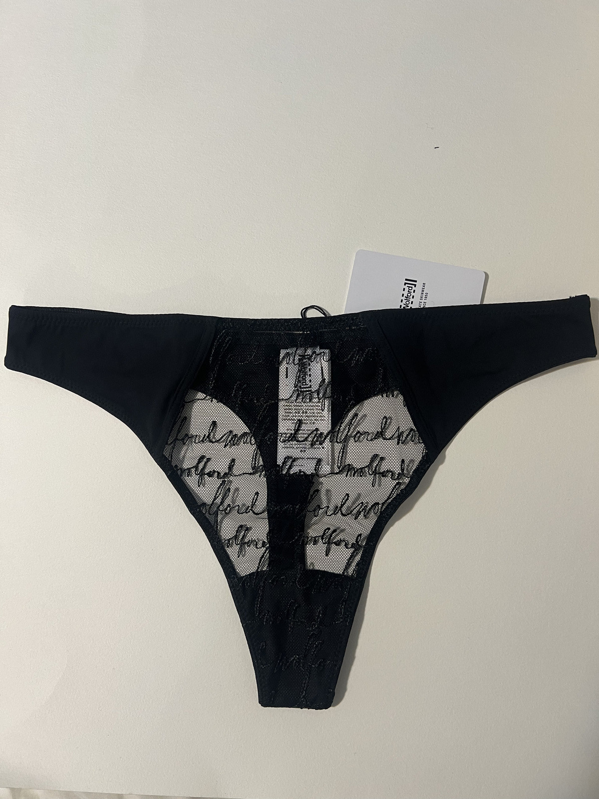 Wolford embroidered logo obsessed tulle Black Med string thong panty Retail $80
