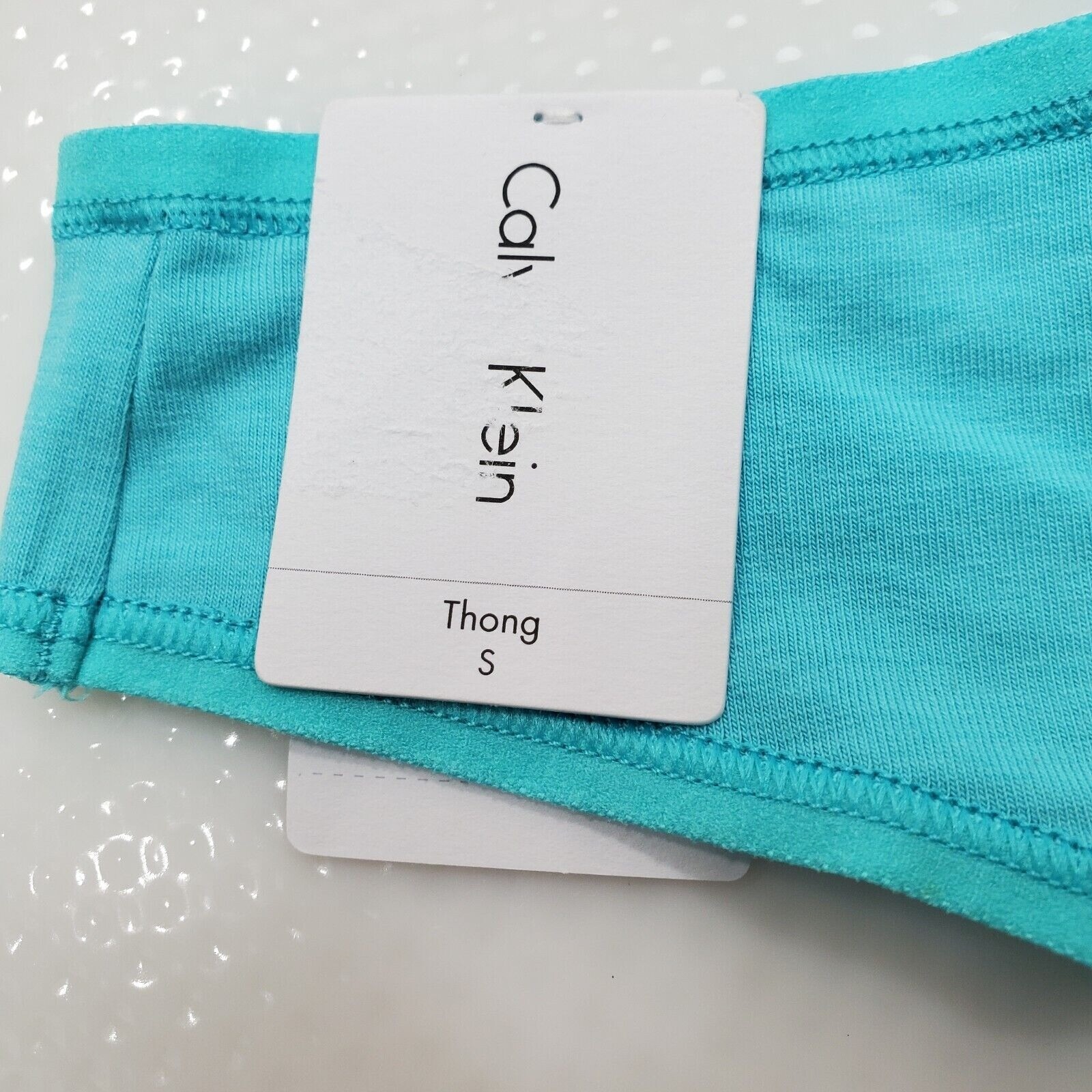 Calvin Klein 3 pack Women’s Form Thong Ripple color light blue Size small-$45