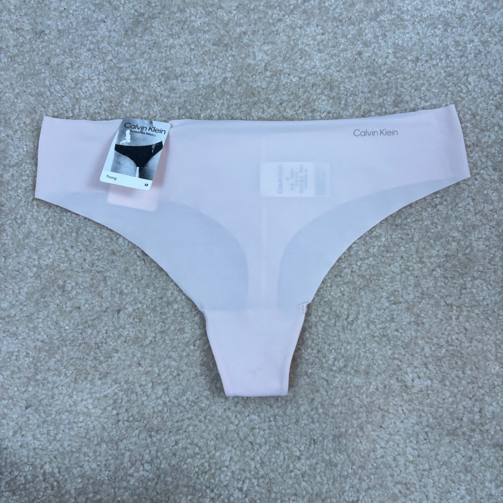 Calvin Klein Invisibles Micro Thong Pale Pink Seamless No-Show Panty Size M NEW