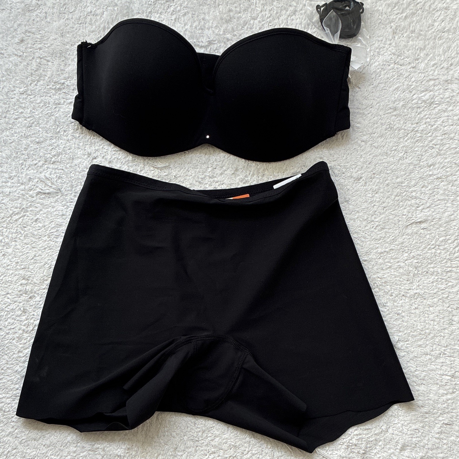 Strapless black shorts with adjustable straps, size 30D. Invisible black shorts,