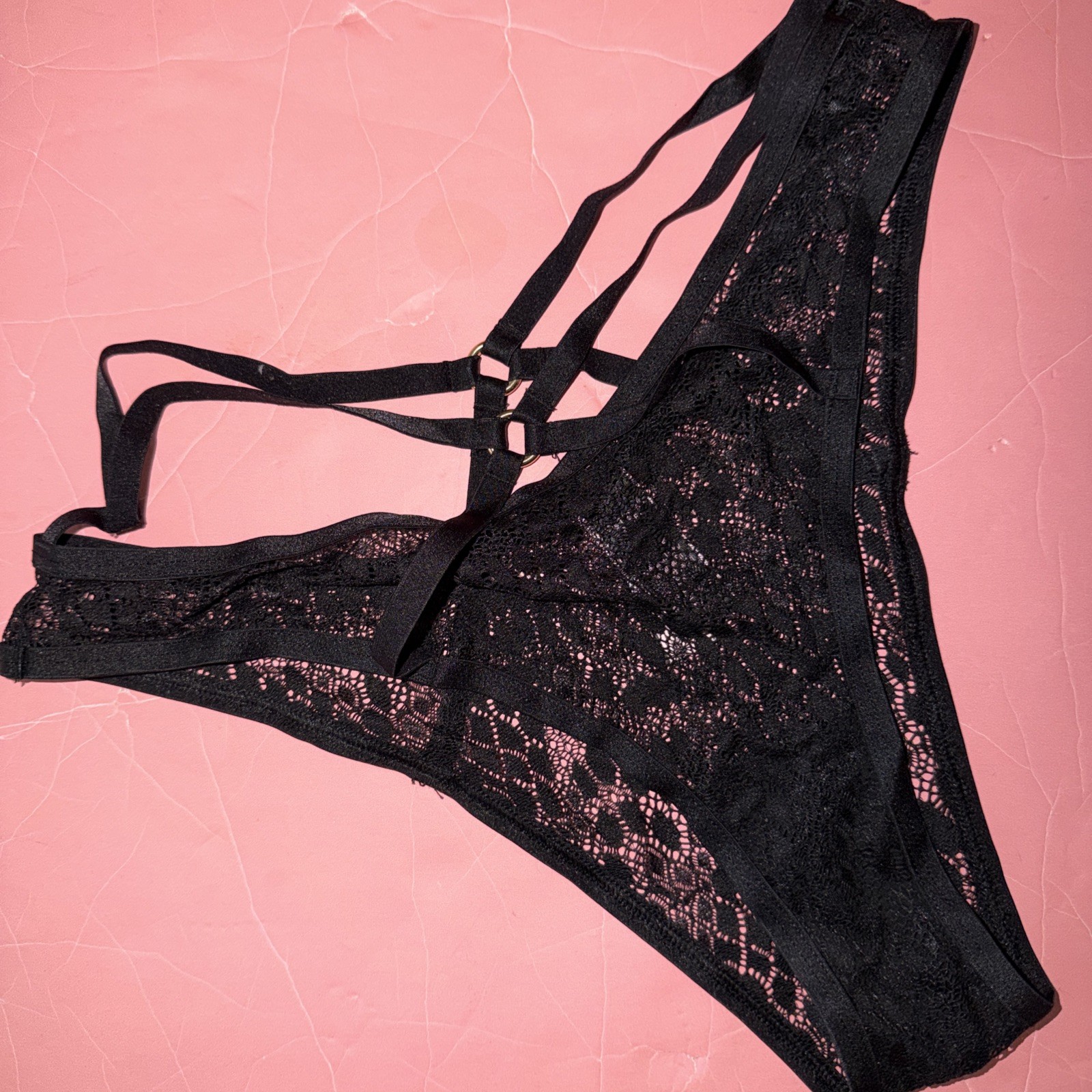 Victoria’s Secret M Panty Brazilian Slip BLACK lace Gold Rings Strappy Very Sexy