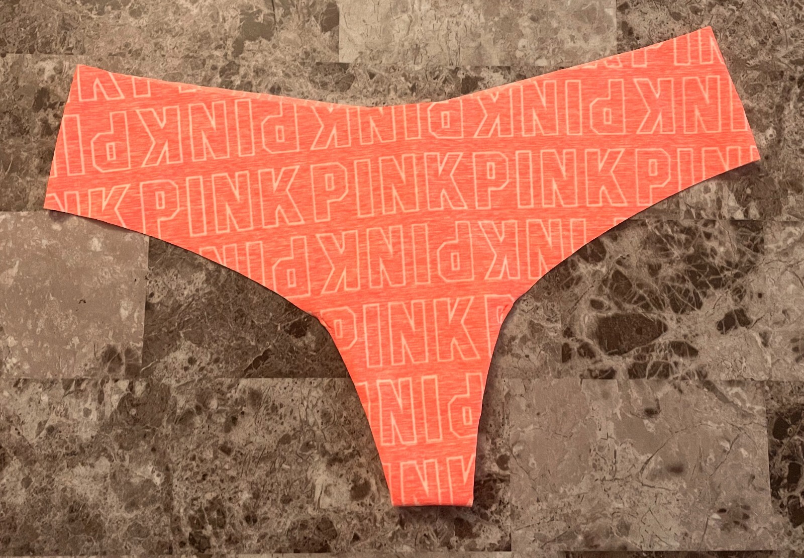 NWOT VICTORIA’S SECRET PINK MEDIUM ORANGE WHITE LOGO RARE NO SHOW THONG PANTIES