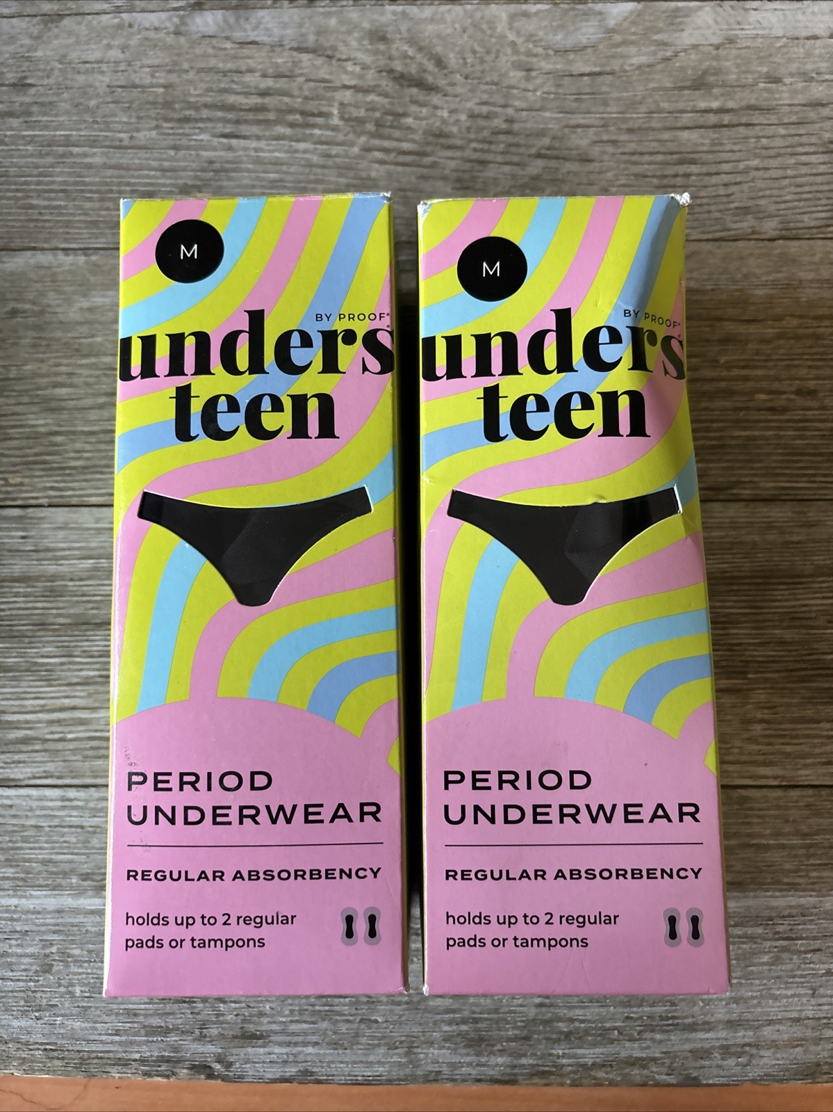 Lot of 2- Unders Teen Brief Regular black medium. Slightly damaged box.