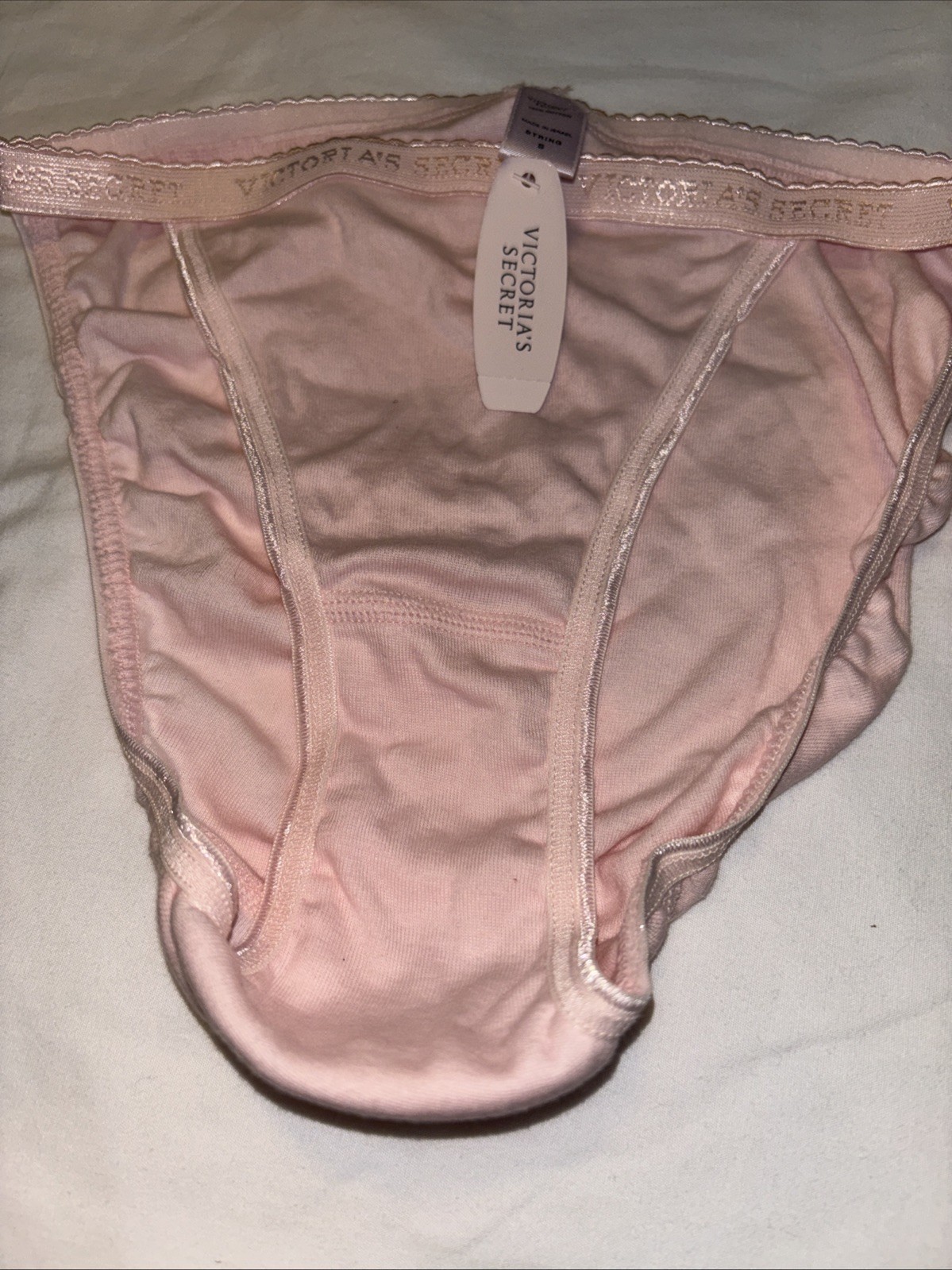 Victoria’s Secret String Bikini Panties. New with Tags Size Small .pink Logo