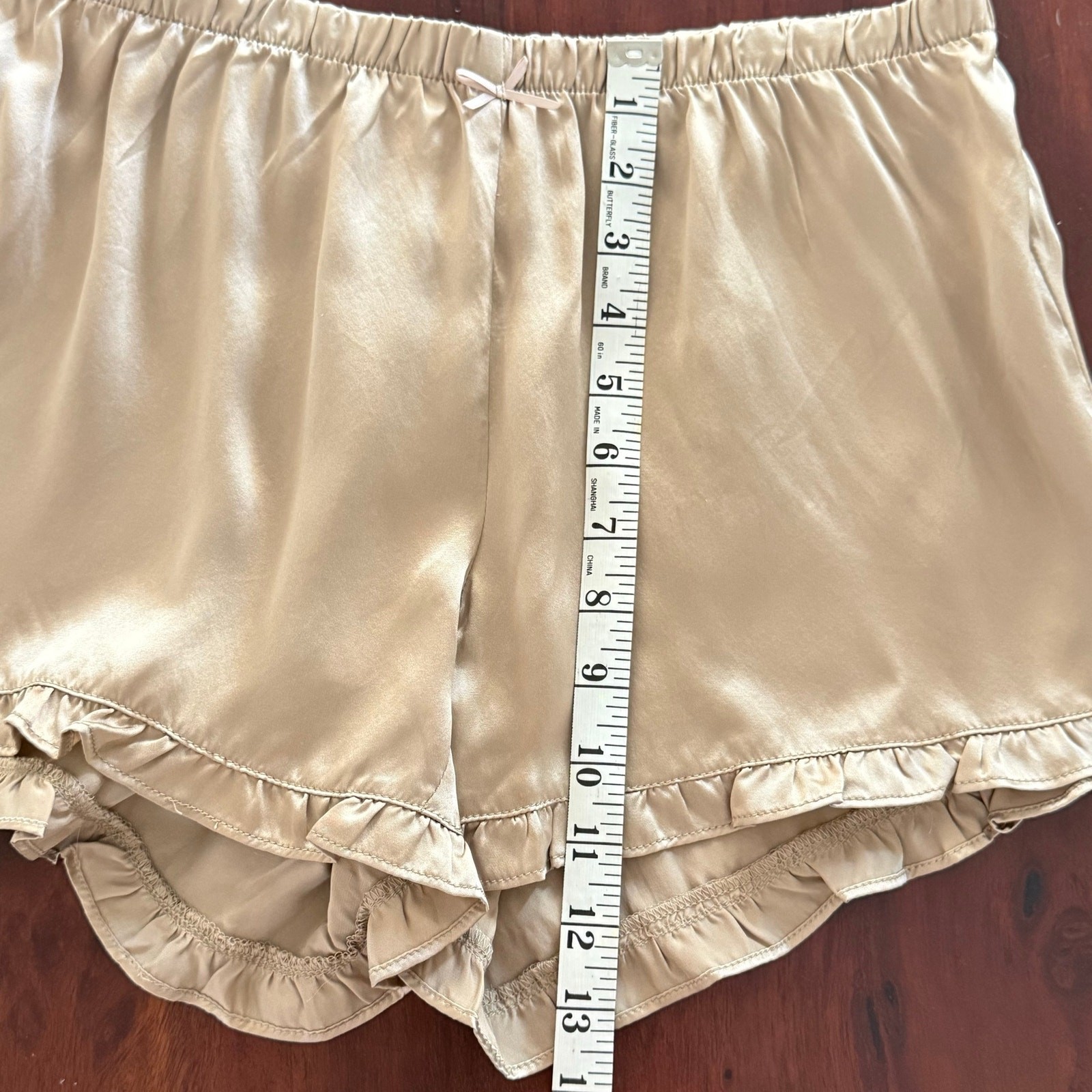 NWT Gold Hawk silk women’s shorts brown sand color size Medium ruffle trim
