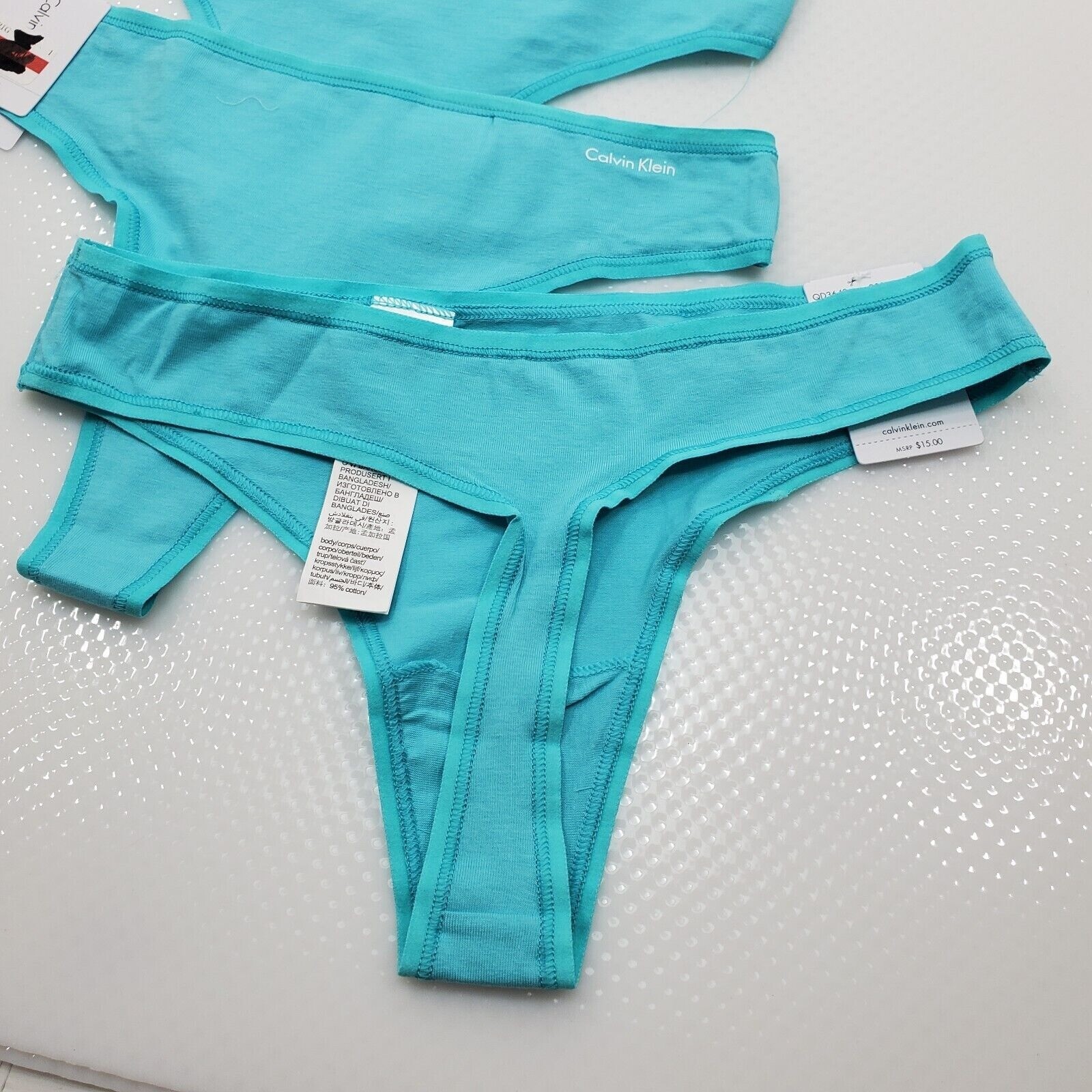Calvin Klein 3 pack Women’s Form Thong Ripple color light blue Size small-$45
